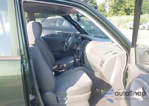 1999 Chevrolet Tracker from USA, damaged, VIN 2CNBJ13C9X6928226